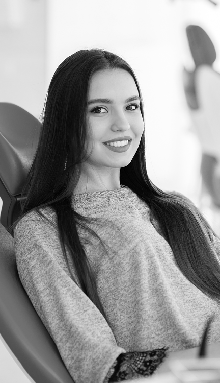 Teen patient smiling in the dental chair